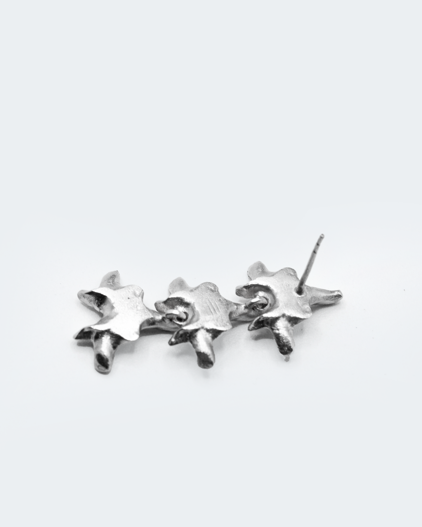 ORECCHINI “SPINE TRIUM”